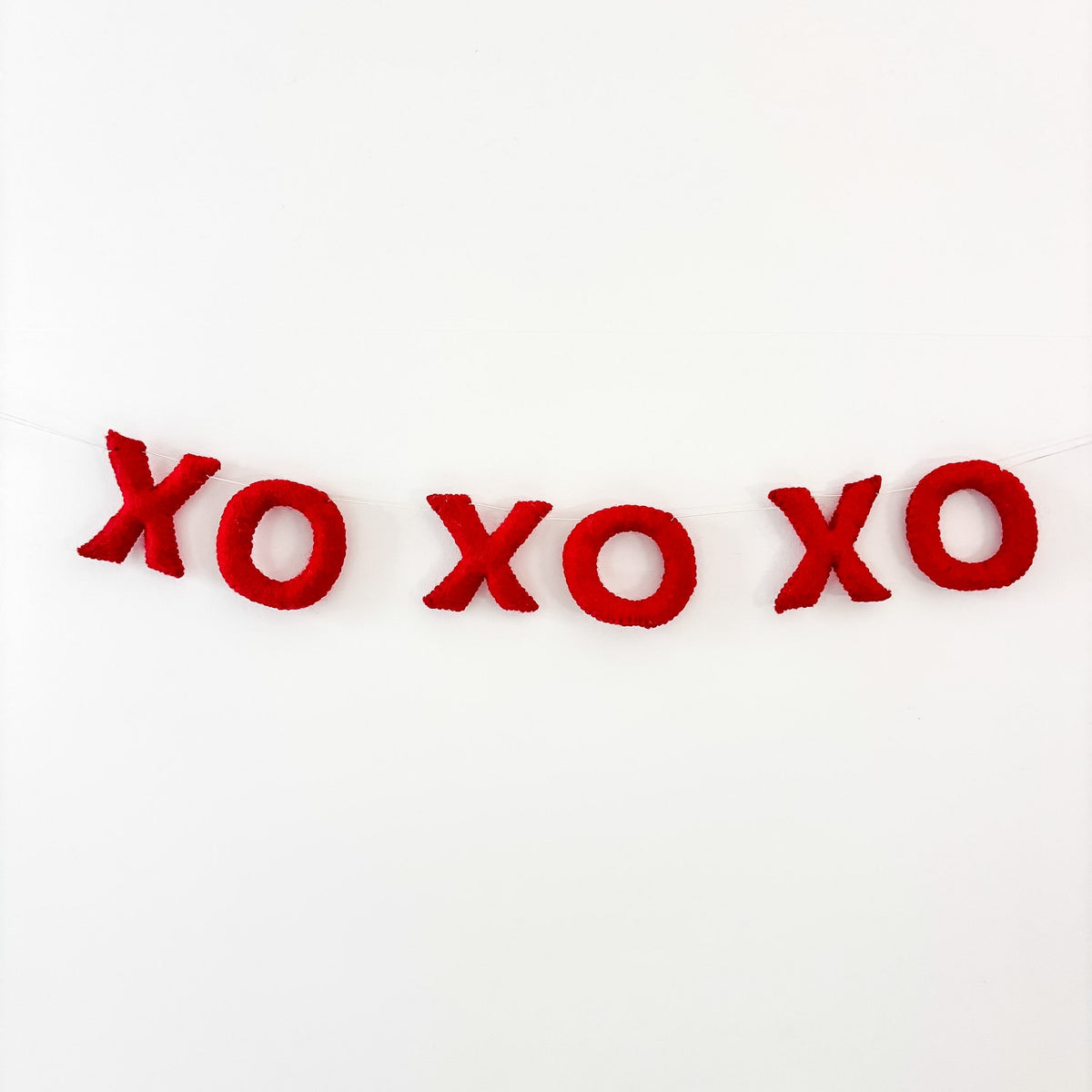 XOXO Felt Garland Handmade in Nepal | Wool Love Decor Wall Hanging